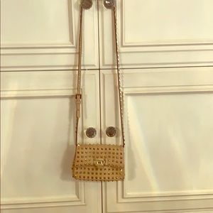 Rockstud Valentino cross body bag. tan